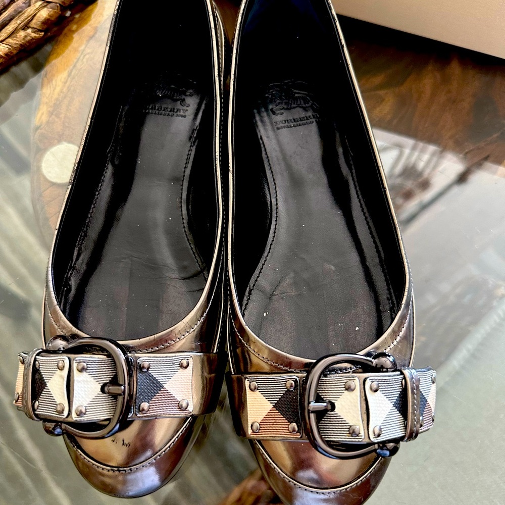 Really cute Burberry flat shoes , never worn outside, 3-4 time worn in inside